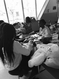 JV Girls Basketball team preparing post-game snacks for the Middle School Flag football team on 10/1/19.